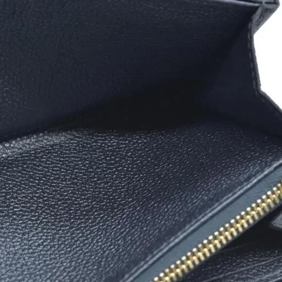 Louis Vuitton LV Monogram Empreinte Leather Zippy Wallet - Picture 14 of 14